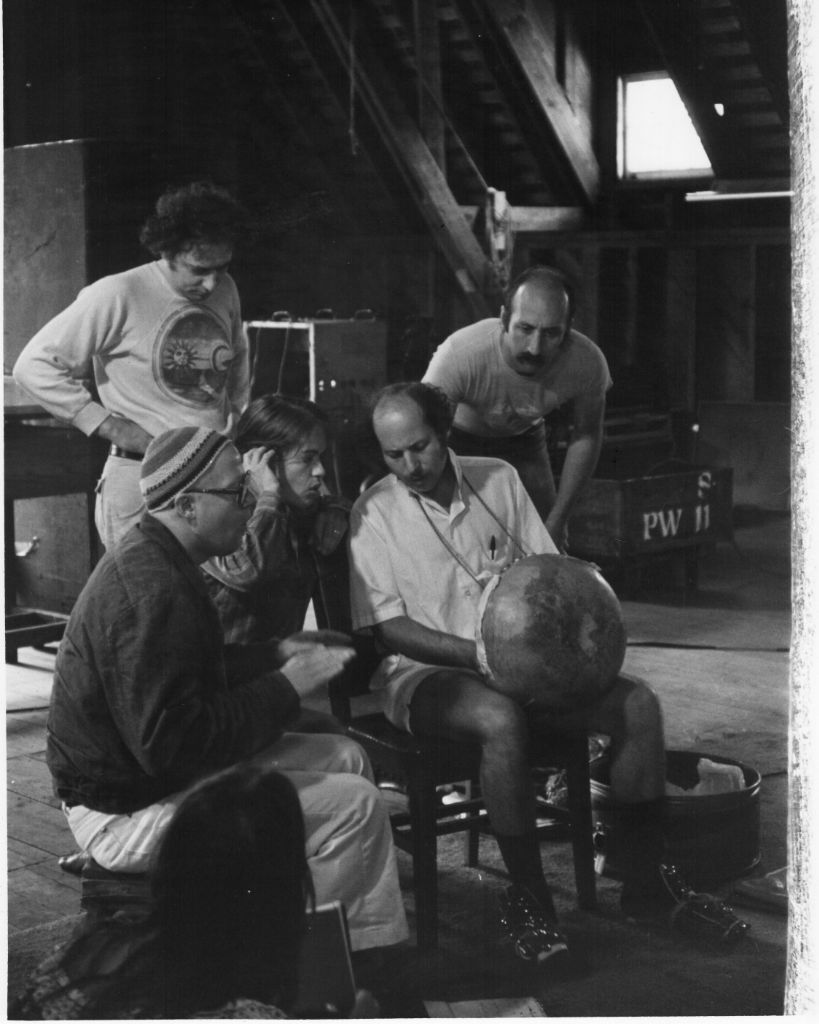 Noel Stookey (right) leans over Paul Berliner, during the making of the Common Ground album